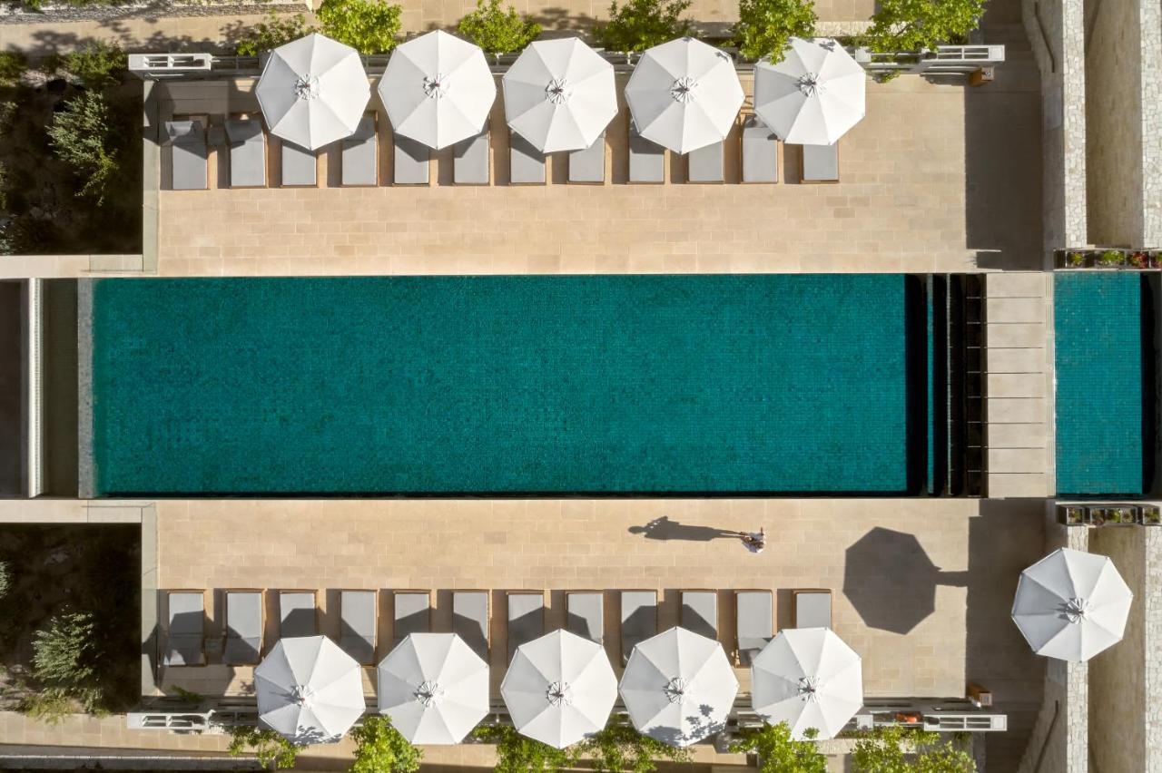 Minthis Resort Tsadha Esterno foto Aerial view of the pool at the Hotel