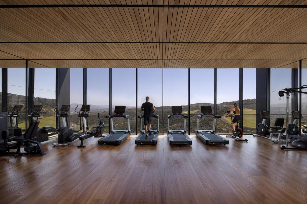 Minthis Resort Tsadha Esterno foto The gym at the hotel