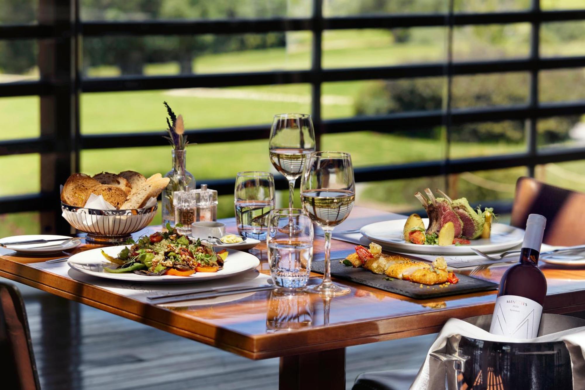 Minthis Resort Tsadha Esterno foto Restaurant
