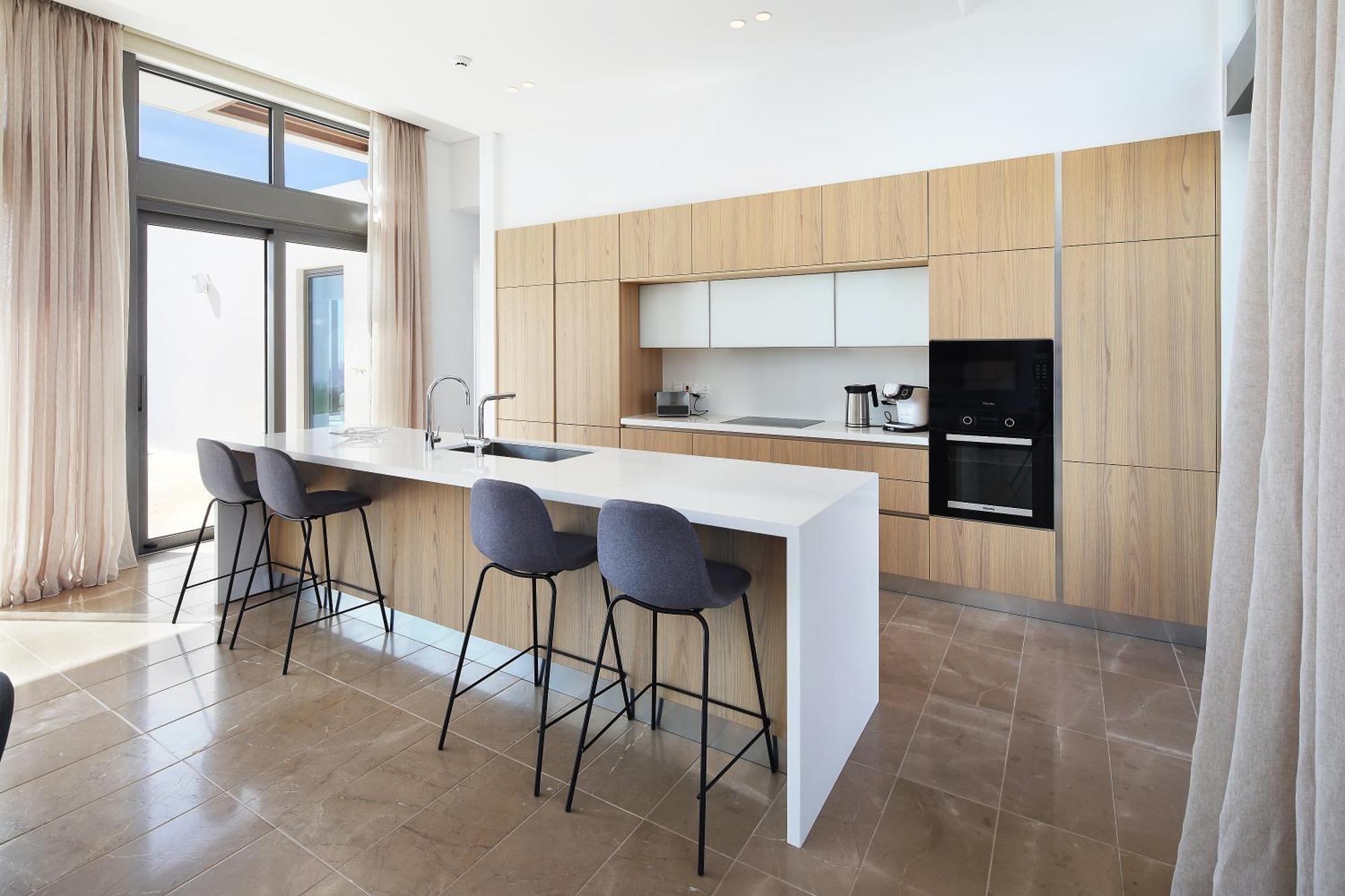 Minthis Resort Tsadha Esterno foto A kitchen