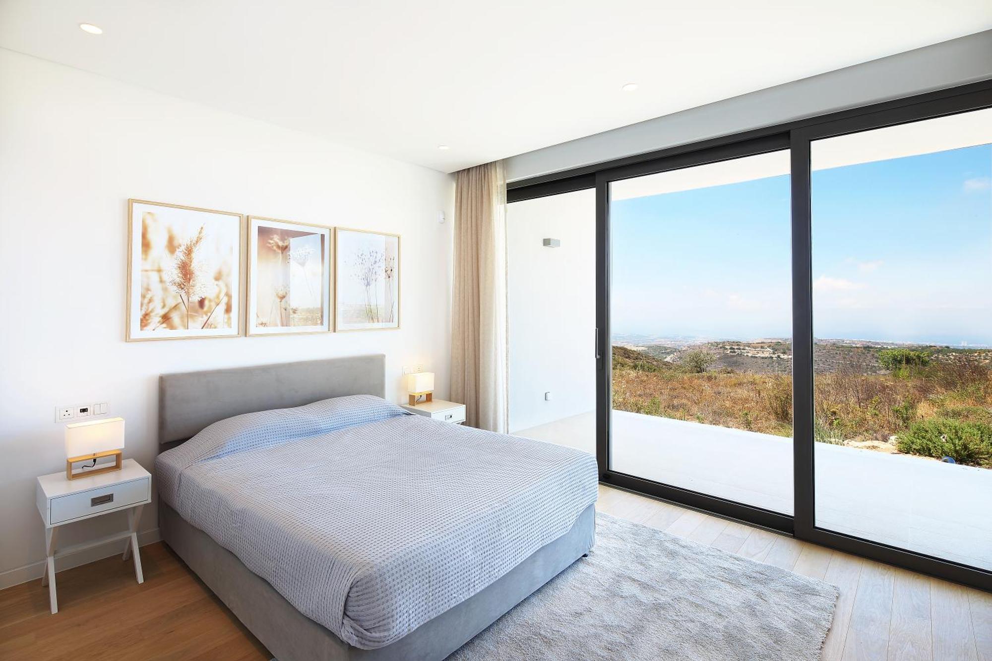 Minthis Resort Tsadha Esterno foto Bedroom with sliding doors