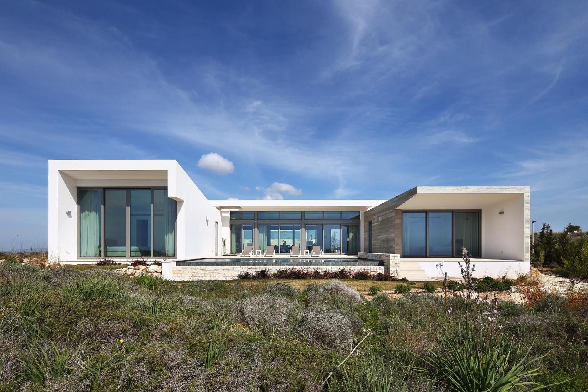 Minthis Resort Tsadha Esterno foto Villa in Ibiza