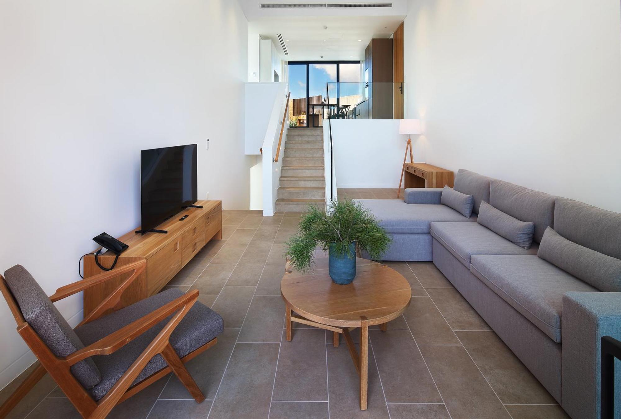 Minthis Resort Tsadha Esterno foto Living room